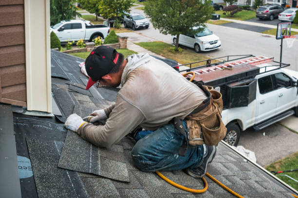 Professional Roofing technician working in Wingate, IN